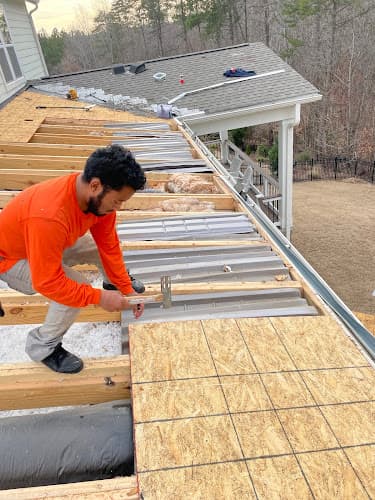 Weather Roofing — attic cleaning services