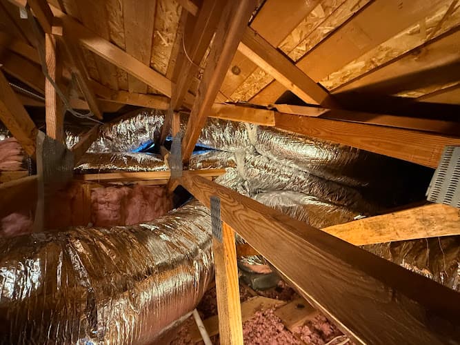 Atticman Heating and Air Conditioning, Insulation — attic cleaning services
